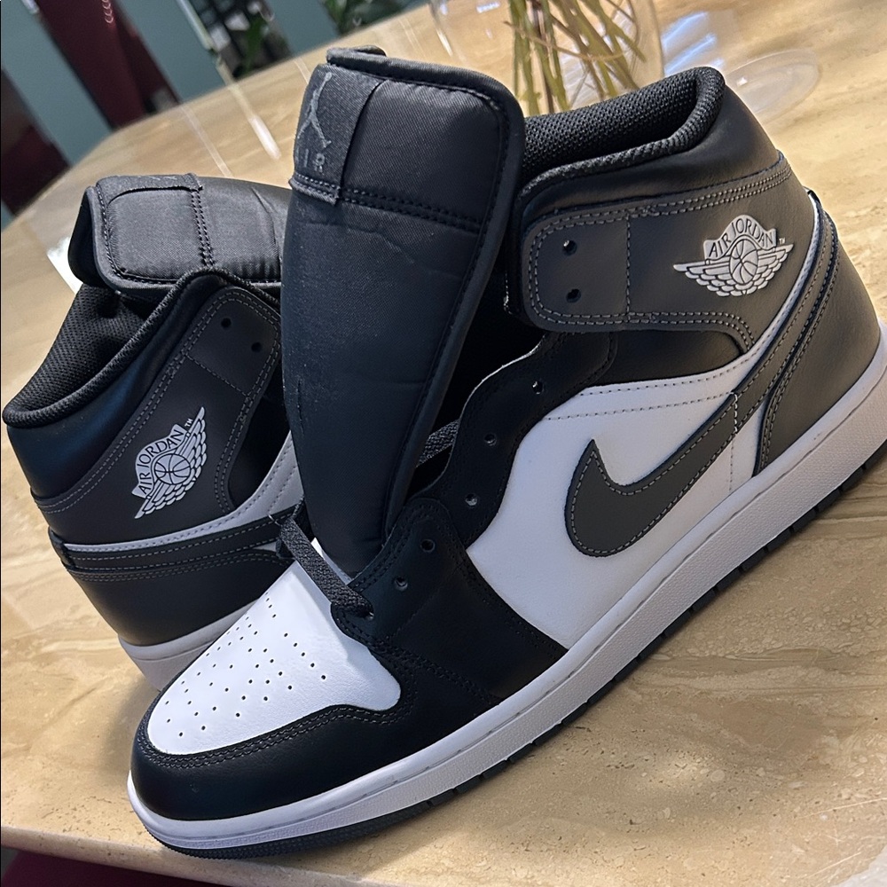 Jordan Black and White High-Top Sneakers Air Jordan 1 Mid